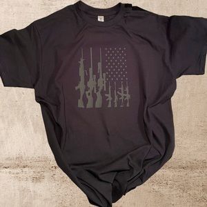 Custom short-sleeved black American flag T-shirt designed with firearms